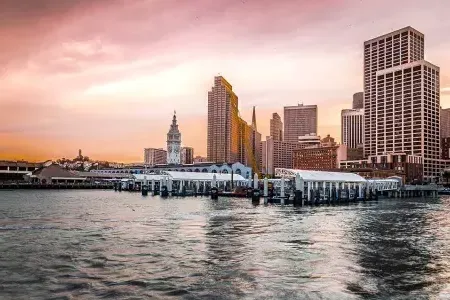 的 Ferry Building at Sunset from 的 bay.